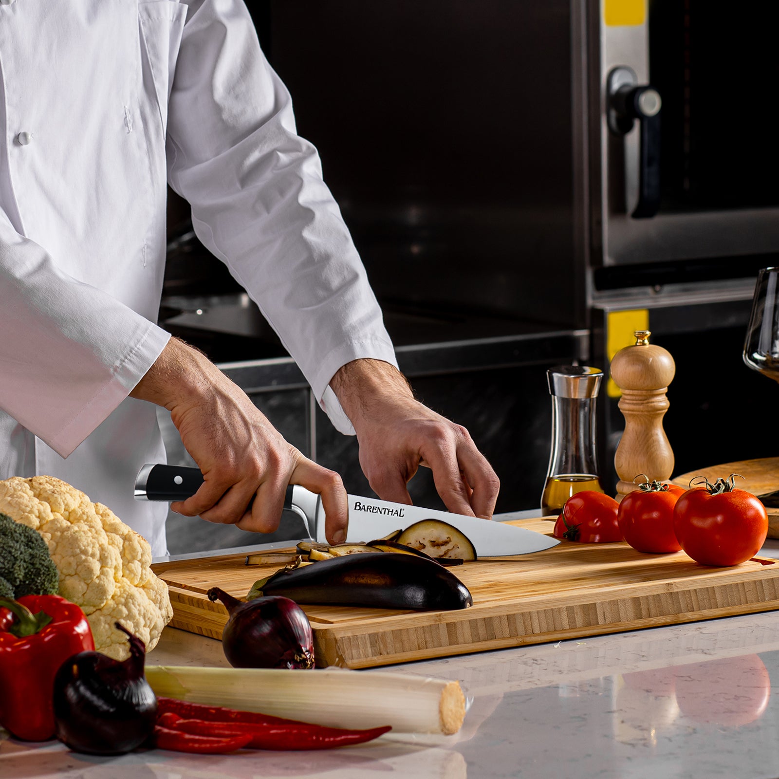 Barenthal 17-piece kitchen knife set comes with knife block and sharpener, featuring detailed designs of various kitchen knives and stylish storage block.