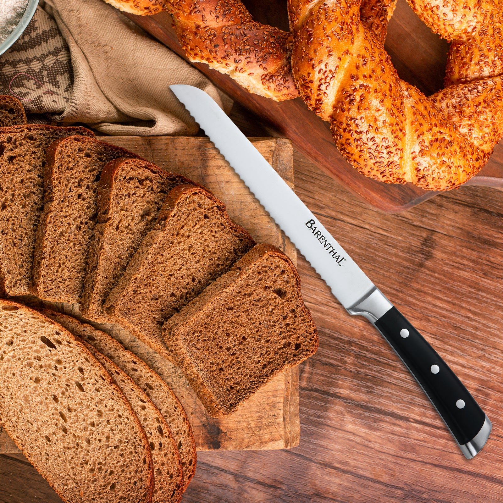 Barenthal 17-piece kitchen knife set with wooden storage block and sharpener, various kitchen knives neatly arranged on the wooden holder.