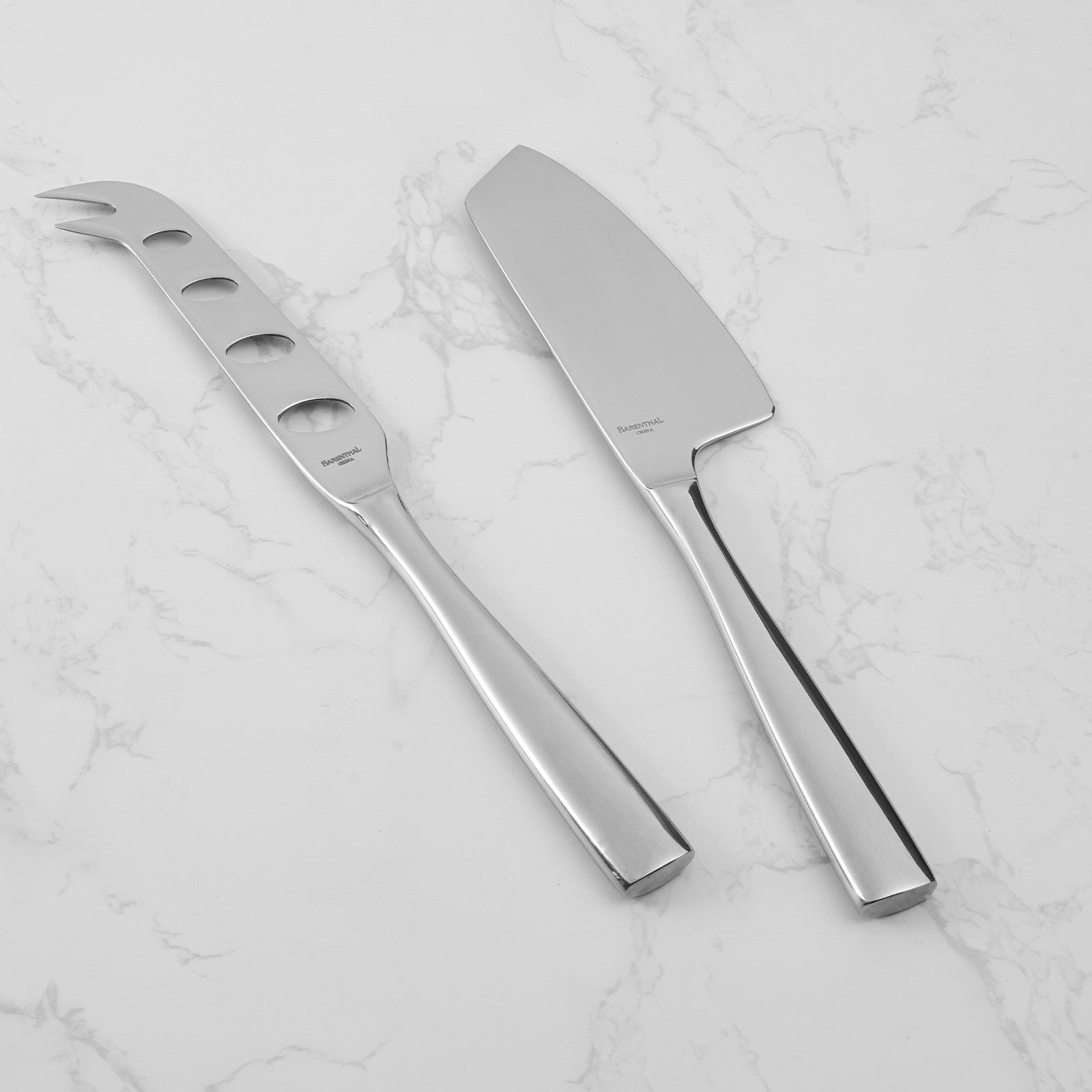 Barenthal Marin 2-Piece Cheese Knife Set, featured metallic blades and stylish handle design, ideal for cutting various types of cheese