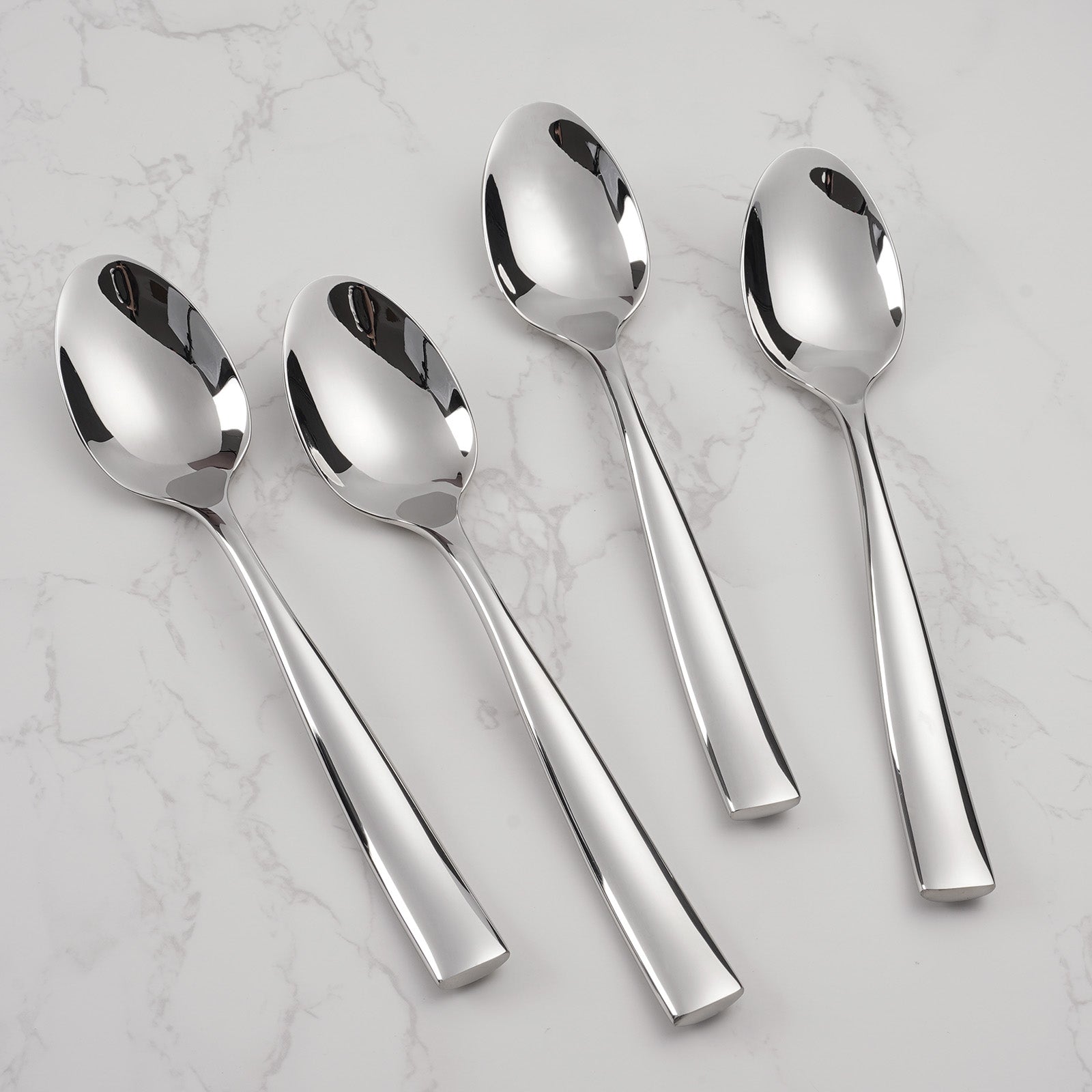 Barenthal 4-piece dinner spoons, smooth stainless steel material, classic table accessories for formal dining.