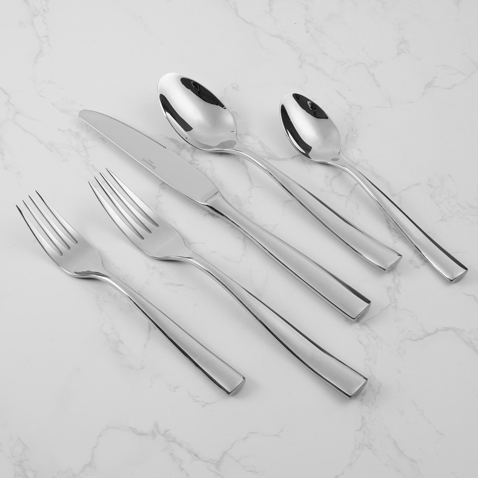 Barenthal Flat Cutlery Set, crafted from smooth stainless steel, displays fine details and luster of the 5-piece set.