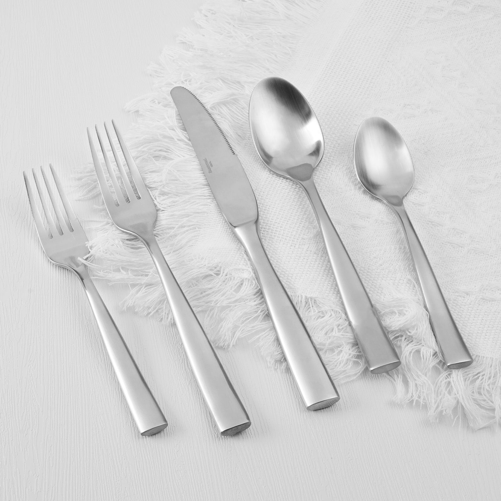 Barenthal Marin Smooth Surface Flatware Set, includes knives, forks and spoons, showcasing sleek stainless steel finish and elegant design.